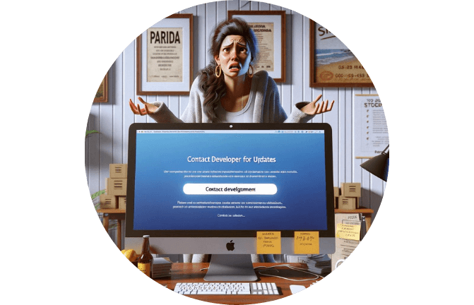 Mulher com expressão de frustração em frente a um computador exibindo uma tela que solicita contato com o desenvolvedor para atualizações. Ela está em um escritório com prêmios pendurados na parede ao fundo.